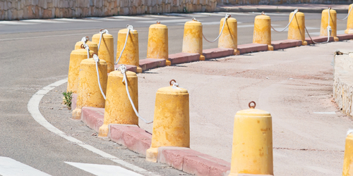cement pylons along the road