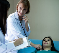 Doctor diagnosing patient