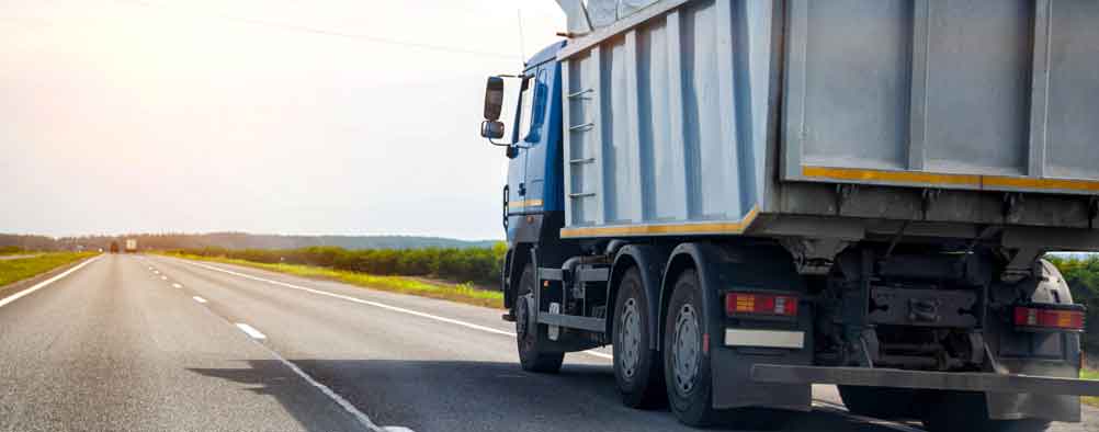 several trucks on the road